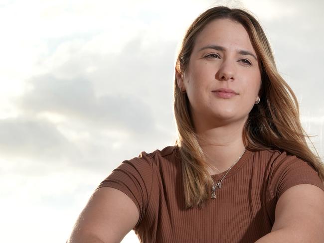 At Glenelg, Alannah Bercys,27, suffers from PMDD (premenstrual dysphoric disorder), experiencing symptoms such as extreme fatigue, exhaustion, anxiousness, paranoia, depression and brain fog. 28 March 2025. Picture: Dean Martin