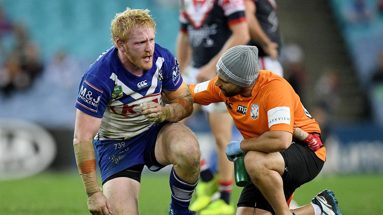 Graham suffered plenty of head knocks. Photo: AAP Image/Dan Himbrechts