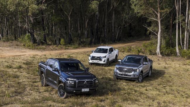 Mitsubishi Triton, Toyota HiLux and Ford Ranger utes. Photo: Mark Bean