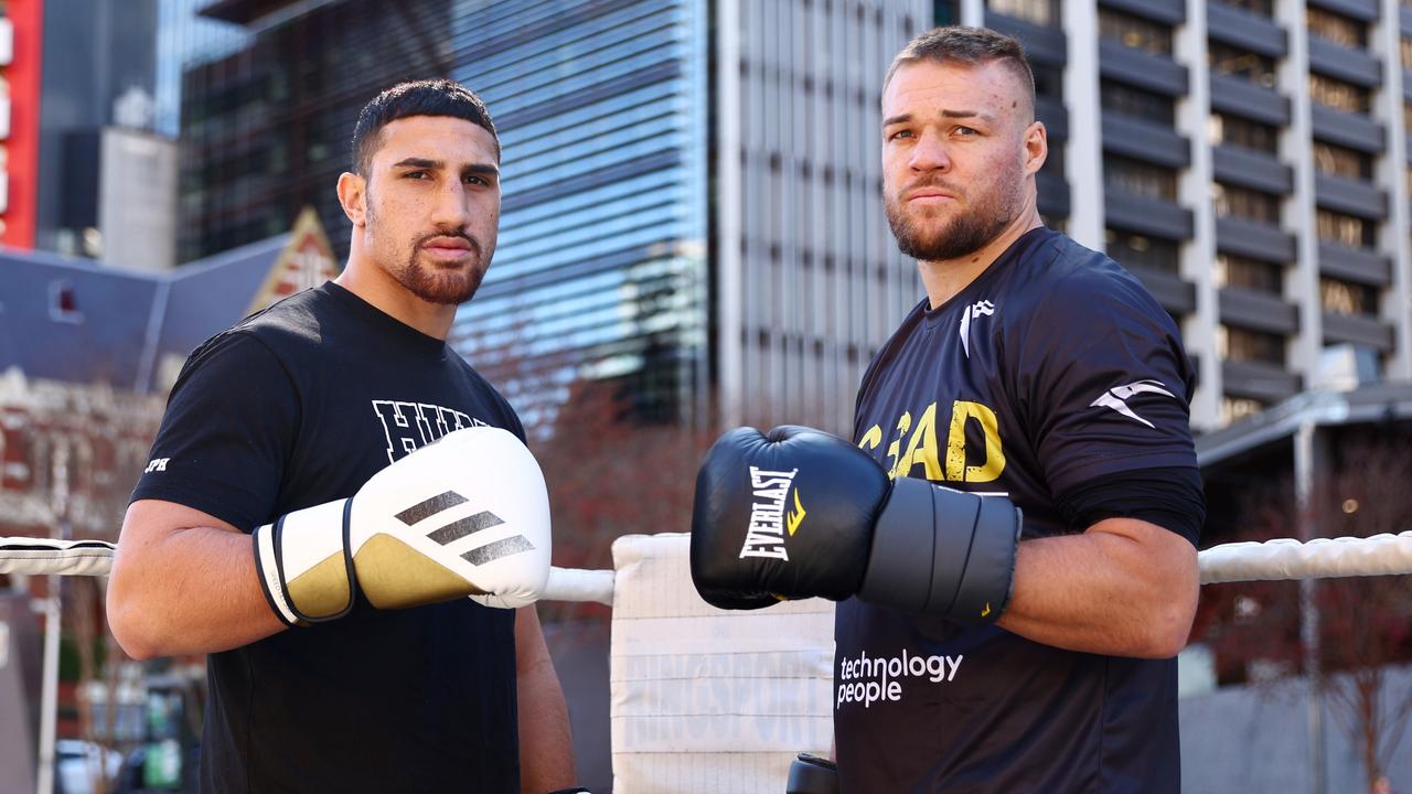 Justis Huni and Joe Goodall face off during an open training session at King George Square on June 10, 2022 in Brisbane, Australia. (Photo by Chris Hyde/Getty Images)