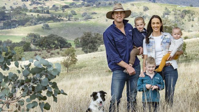 Fergus and Jenna Watts Fergus and Jenna Watts, farming at Fernhill Agriculture with their young children Navy, Tennyson and Cosette, with Border Collie Sassy. Picture: Zoe Phillips