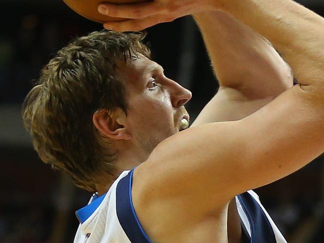 DALLAS, TX - JANUARY 23: Dirk Nowitzki #41 of the Dallas Mavericks takes a shot against Pau Gasol #16 of the Chicago Bulls at American Airlines Center on January 23, 2015 in Dallas, Texas. NOTE TO USER: User expressly acknowledges and agrees that, by downloading and or using this photograph, User is consenting to the terms and conditions of the Getty Images License Agreement. (Photo by Ronald Martinez/Getty Images)