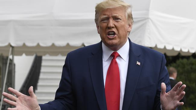 Donald Trump talks to reporters on the South Lawn of the White House. Picture: AP.