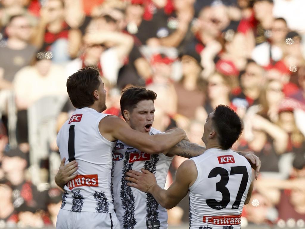 Jack Crisp and the Pies celebrate in front of the enormous crowd. Picture: AFL Photos/Getty Images