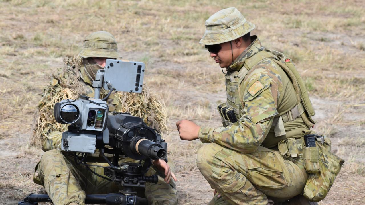 Soldiers using an automatic grenade launcher at the Shoalwater Bay Training Area for Exercise Diamond Walk 2021.