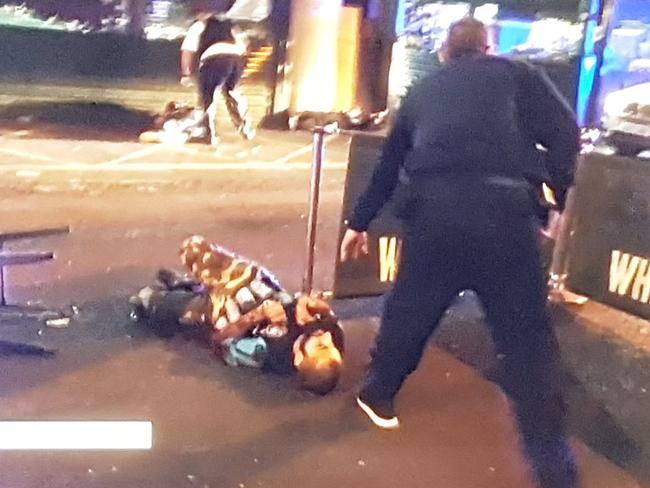 Police shoot one of the terrorists. Source: BBC