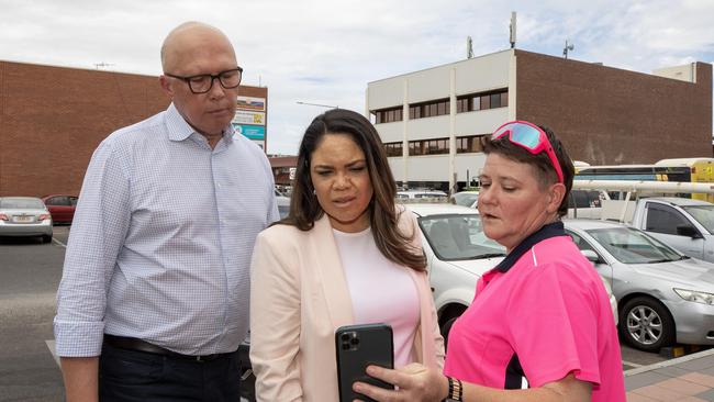 Dutton in Alice Springs with Price and a local. Picture: Liam Mendes