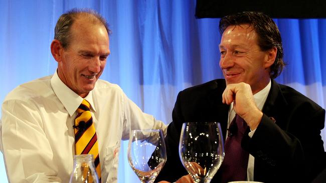 28 Sept 2006 NRL Grand Final breakfast at The Westin hotel for Melbourne Storm and Bris Broncos. Broncos coach Wayne Bennett and Storm coach Craig Bellamy catch up for a chat. headshot smiling sport rugby league empty wine glasses glassware
