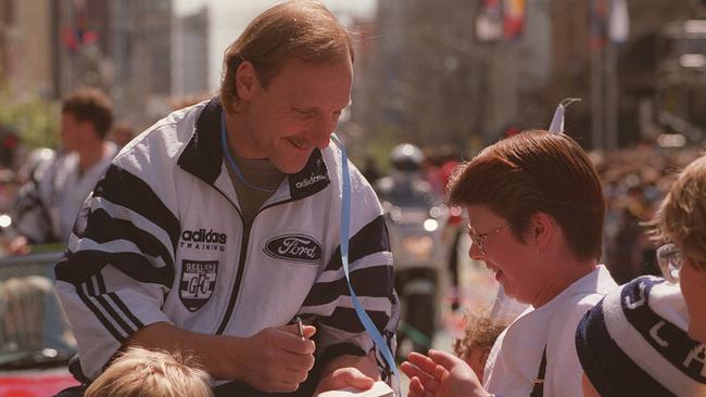 Geelong co-captain Gary Ablett surrounded by fans during the 1995 parade. Picture: HWT Library.