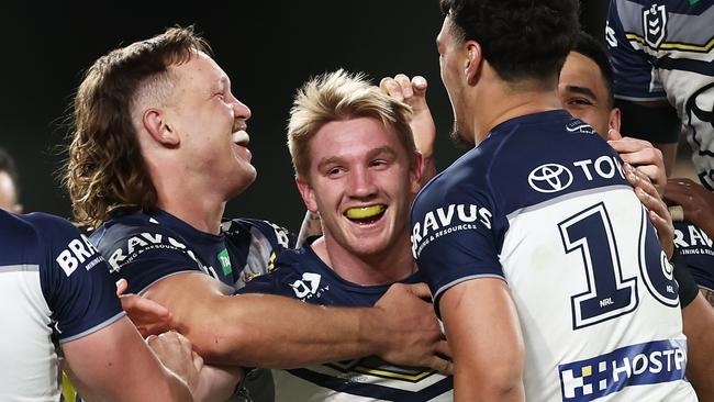 SYDNEY, AUSTRALIA - JUNE 25:  Tom Dearden of the Cowboys celebrates with team mates after scoring a try during the round 17 NRL match between South Sydney Rabbitohs and North Queensland Cowboys at Accor Stadium on June 25, 2023 in Sydney, Australia. (Photo by Matt King/Getty Images)