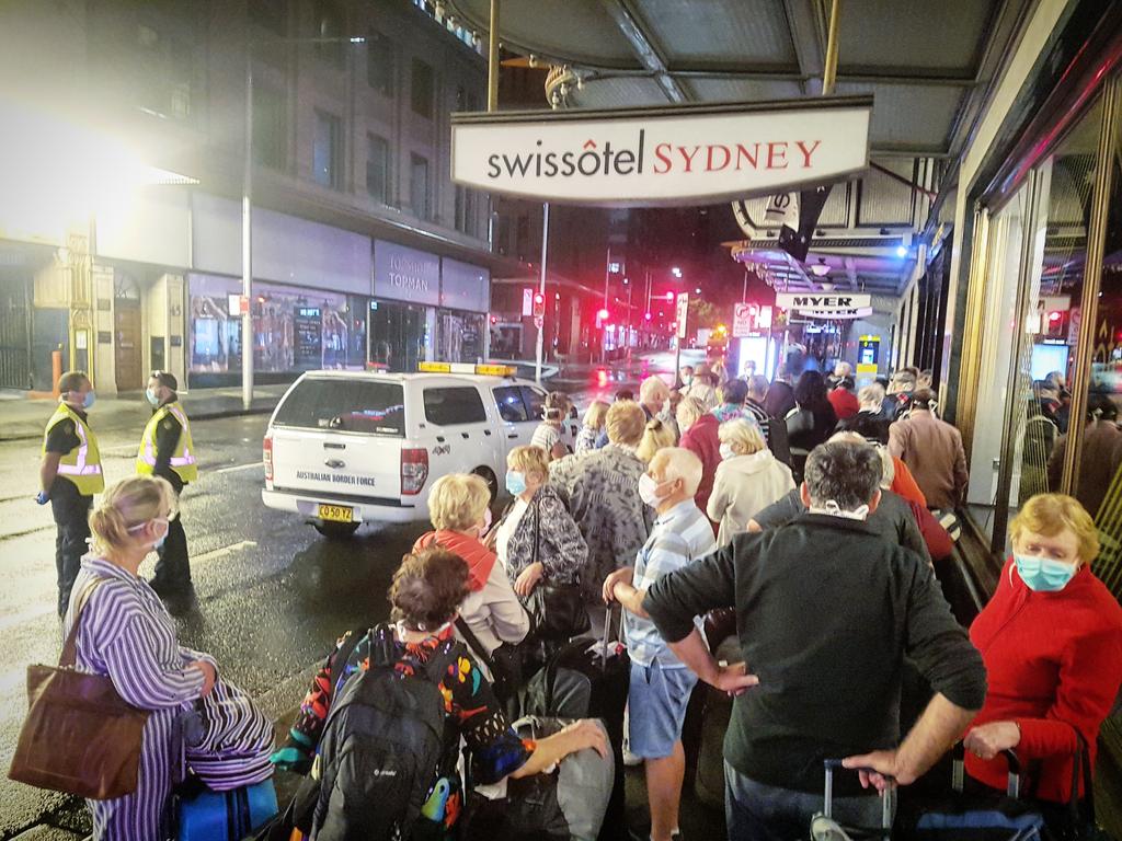 Returned travellers arrive at the Swissotel in Sydney. Picture: Tom Huntley