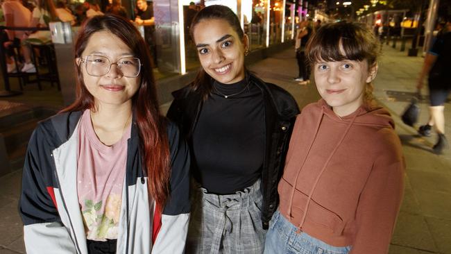 Ronny Chen, Bhavsheen Kaur and Kira Martin at Southbank talk about whether they feel safe at night in Melbourne. Picture David Geraghty