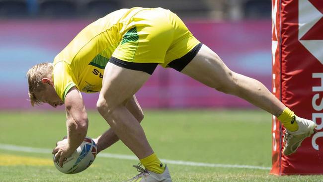 Lachie Miller of Australia scores against Japan during day one of the Sydney 7S Rugby tournament at Bankwest Stadium in Sydney, Sunday, February 1 2020. (AAP Image/Craig Golding) NO ARCHIVING, EDITORIAL USE ONLY. Picture: CRAIG GOLDING