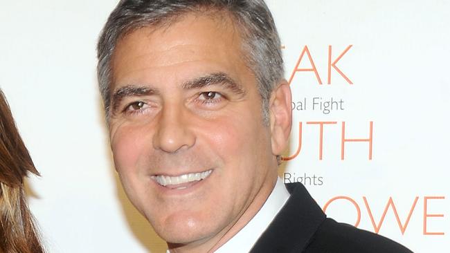 Elisabetta Canalis and George Clooney attend the 2010 Robert F. Kennedy Center for Justice & Human Rights Ripple of Hope Awards Dinner at Pier Sixty at Chelsea Piers on November 17, 2010 in New York City.