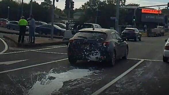 A car splattered by paint after an incident on Smith St. Picture: Keith Woods.