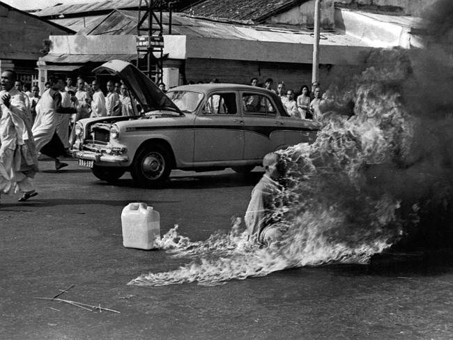 Powerful: Thich Quang Duc, a 73-year-old Buddhist monk, is soaked in petrol before setting fire to himself in Saigon, Vietnam, June 11, 1963. AP Photo/Malcolm Browne