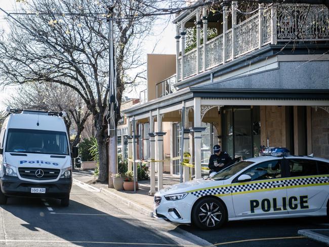 Police are seen on Sturt street after a woman's body was found in a nearby heritage home on Tuesday, September 24, 2019. (AAP Image/ Morgan Sette)