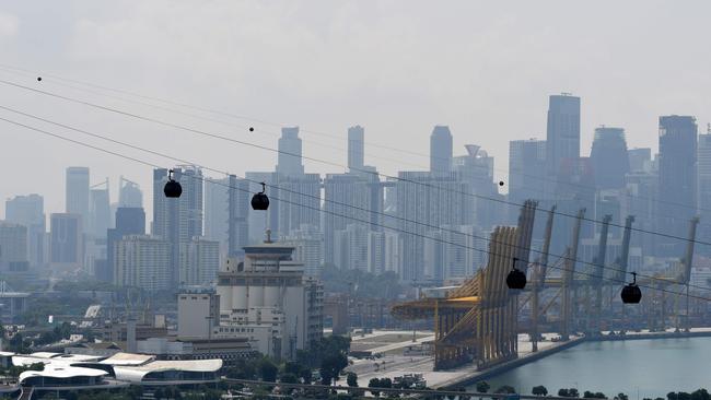 Cable cars ply from Singapore island across to Sentosa island, where the summit will take place. Picture: AFP.