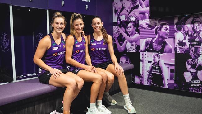 Queensland Firebirds stars Gabi Simpson, Kim Ravaillion, and Ruby Bakewell-Doran in the club's new 'inclusive' uniforms that they will debut in the 2023 Team Girls Cup. Picture: Supplied.