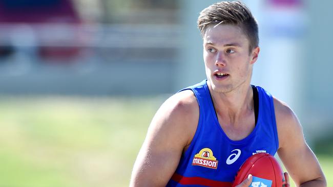 A slimmer Josh Schache hits the track at Whitten oval. Picture: Nicole Garmston