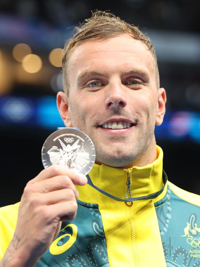 Chalmers proudly displays his silver medal from the 100m freestyle at the Paris Olympic Games. Picture: Ian MacNicol/Getty Images