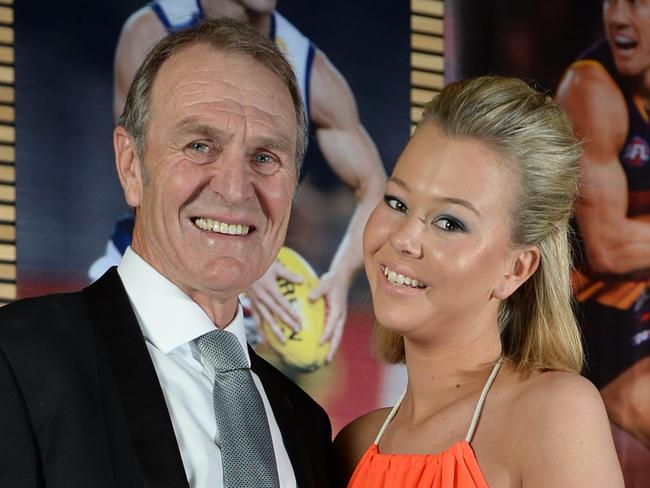 Amy Cornes — pictured with her football legend father Graham.