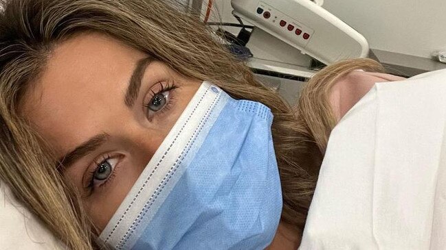 Sophie Guidolin shares photo "alone in hospital" while pregnant, while husband Andrew Firgaira reportedly holidayed in Europe.