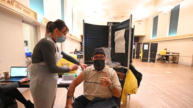 Nurse Francine Millward administers an injection of Pfizer/BioNTech COVID-19 vaccine at a vaccination centre set up at Thornton Little Theatre managed by Wyre Council in Thornton-Cleveleys, northwest England. Picture: AFP