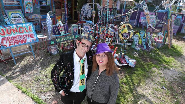 Jungle Phillips with art and dance partner Fran Ferrauto in front of his house on Marion Rd. Picture: Tait Schmaal