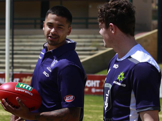 Recruit Bradley Hill chats to his new teammate Lachie Neale at Fremantle Oval on Friday. Picture: Marie Nirme