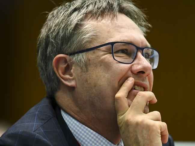 Deputy Governor of the Australian Reserve Bank (RBA) Guy Debelle reacts during a hearing of the House Economic Committee at Parliament House in Canberra, Friday, August 9, 2019. (AAP Image/Lukas Coch) NO ARCHIVING