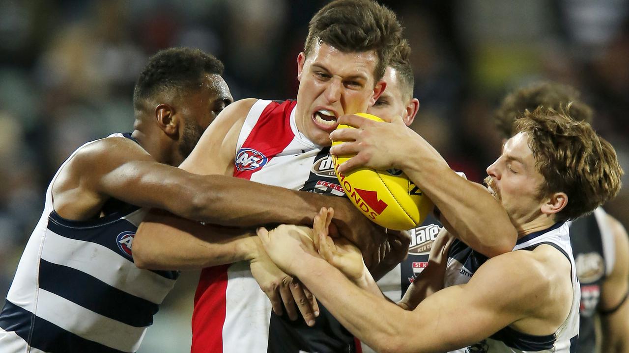 GEELONG, AUSTRALIA - JULY 13: Rowan Marshall of the Saints  is tackled during the round 17 AFL match between the Geelong Cats and the St Kilda Saints at GMHBA Stadium on July 13, 2019 in Geelong, Australia. (Photo by Darrian Traynor/Getty Images)