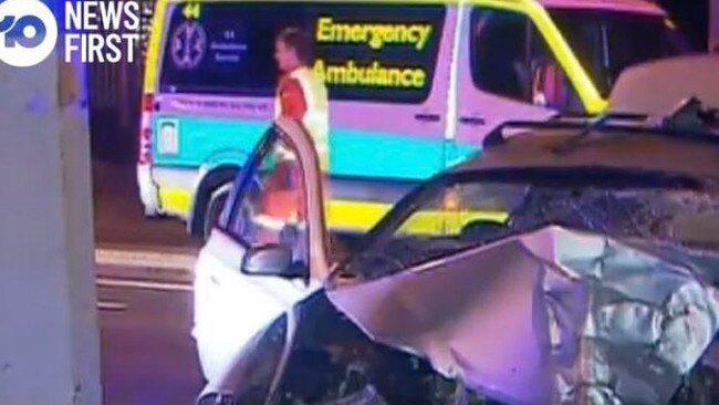 A man remains on the run after crashing into a stobie pole at Klemzig this morning. He left his passenger in the car, the woman taken to hospital with serious injuries. Picture: Hannah Foord/10NewsFirst Adelaide