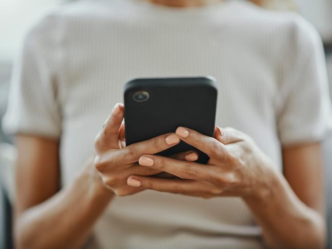 Home woman hands, social media and phone contact, communication and smartphone technology in living room. Closeup mobile app multimedia, reading internet fake news online and 5g web social networking