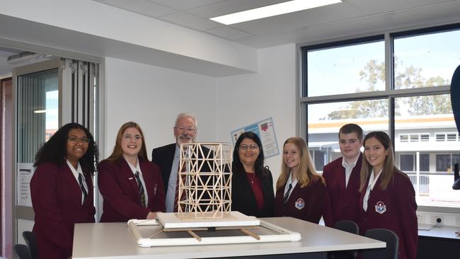 Education Minister Grace Grace and principal Simon Riley with Ipswich State High School students in the school's STEM building on June 1.