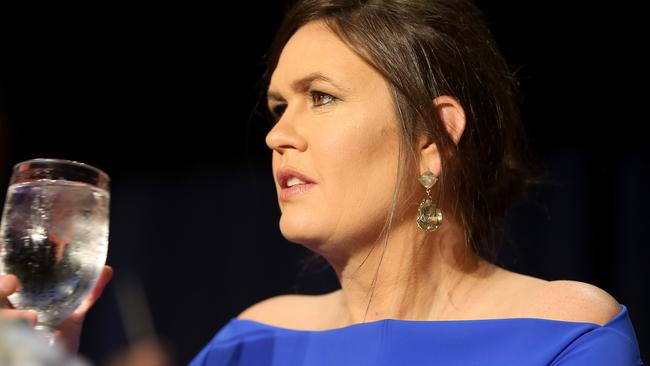 Sarah Huckabee Sanders listens to Michelle Wolf in silence. Picture: Getty Images.