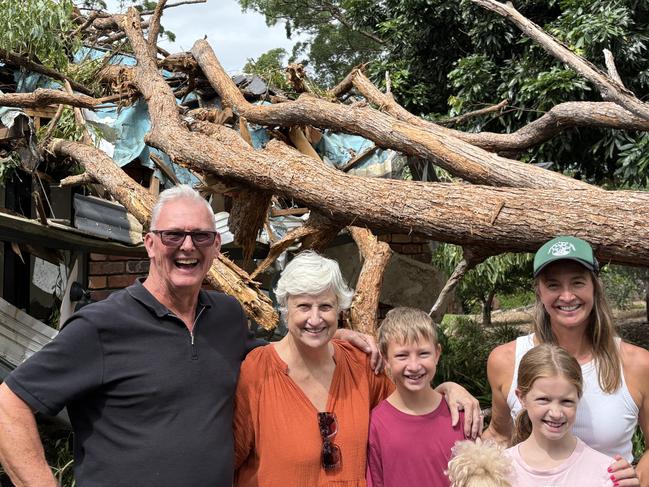 Hanson family infront of tree fallen through Brooke's childhood room (Left to Right Ian Hanson, Sue Hanson, Billy Clarke, Matilda Clarke, Brooke Hanson)