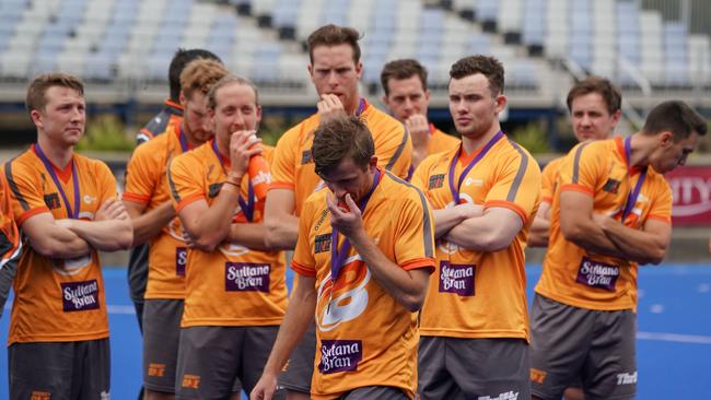 Brisbane Blaze men reflect on the loss. (AAP Image/Scott Barbour)