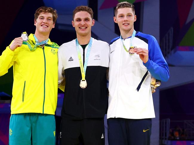 Silver medalist, Brendon Smith alongside gold medalist Lewis Clareburt of New Zealand and Scotland’s Duncan Scott who won bronze. Picture: Dean Mouhtaropoulos/Getty Images