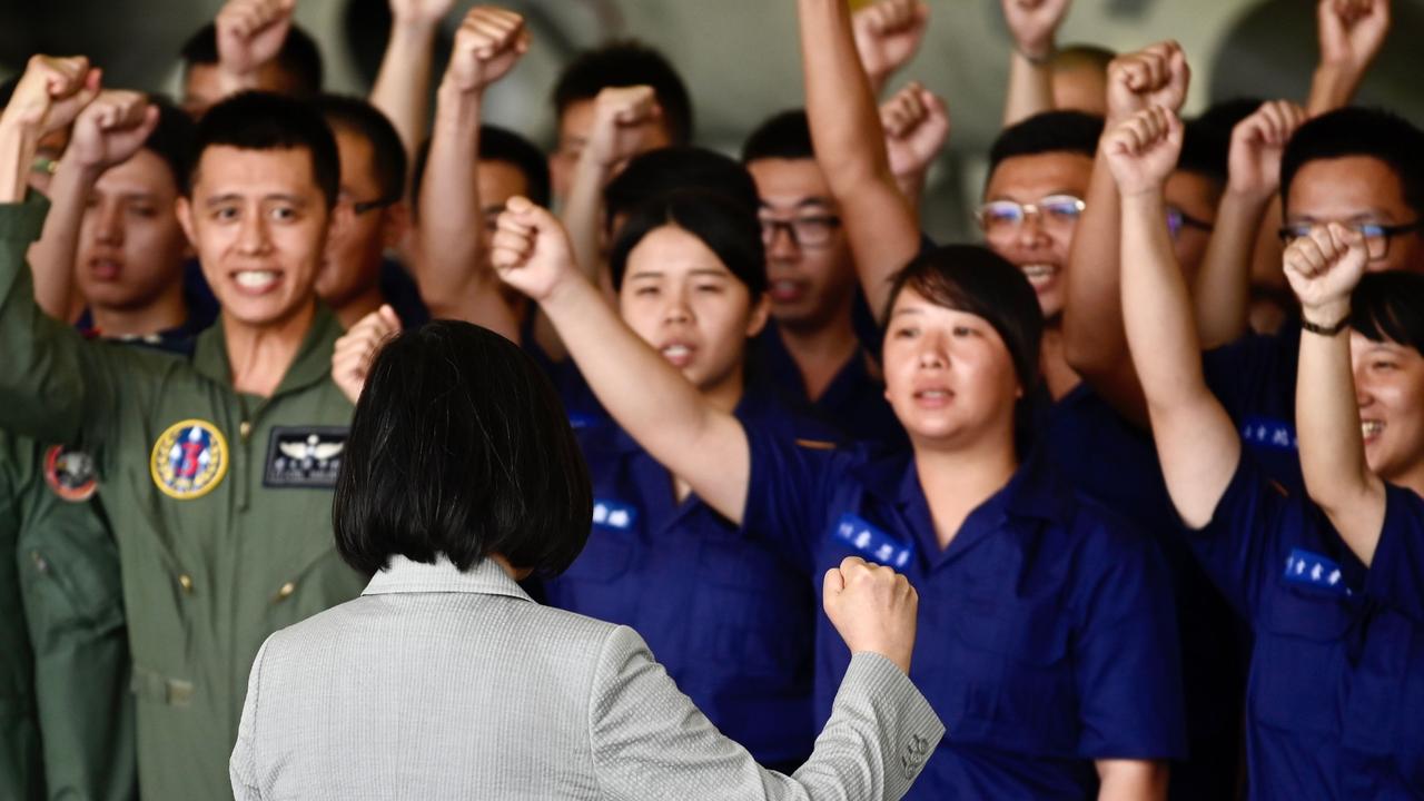 Taiwan's President Tsai Ing-wen gestures in front of members of the military during her visit to Penghu Air Force Base on Magong island in the Penghu islands on September 22, 2020. Picture: Sam Yeh/AFP