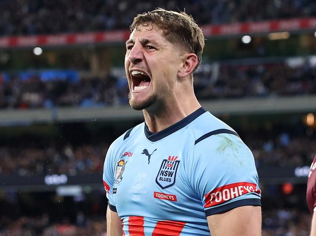 MELBOURNE, AUSTRALIA - JUNE 26:  Zac Lomax of the Blues celebrates after scoring a try during game two of the men's State of Origin series between New South Wales Blues and Queensland Maroons at the Melbourne Cricket Ground on June 26, 2024 in Melbourne, Australia. (Photo by Cameron Spencer/Getty Images)