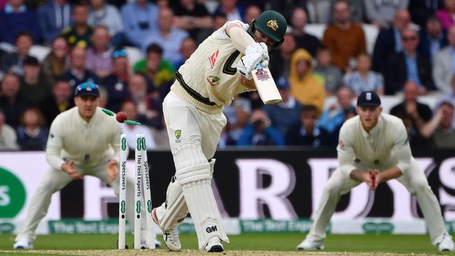 Australia’s Travis Head is bowled by England’s Stuart Broad. Picture: AFP