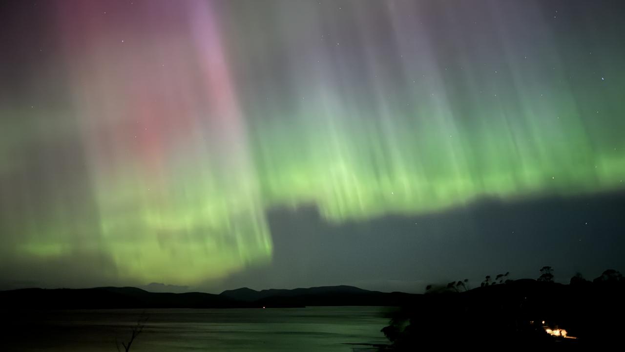 Photos of Aurora Australis taken across Tasmania. Boomer Bay looking southeast. Picture: Bruce Levett