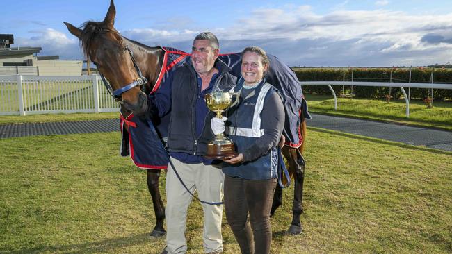 Murray Bridge trainers Oopy MacGillivray and Dan Clarken hold the actual Melbourne Cup with their horse 'The Map". Picture Mark Brake