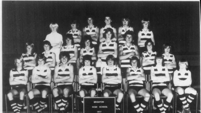 SA football champions Stephen Kernahan and Chris McDermott in a Brighton High team photograph. Both are sitting behind the sign.