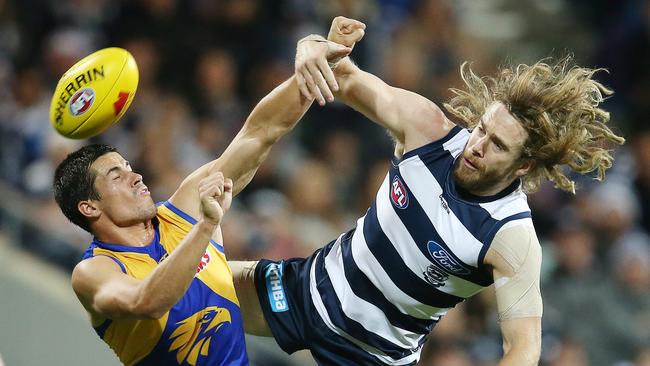 Cam Guthrie flies for a mark against West Coast’s Liam Duggan in Round 6. Picture: Michael Klein.