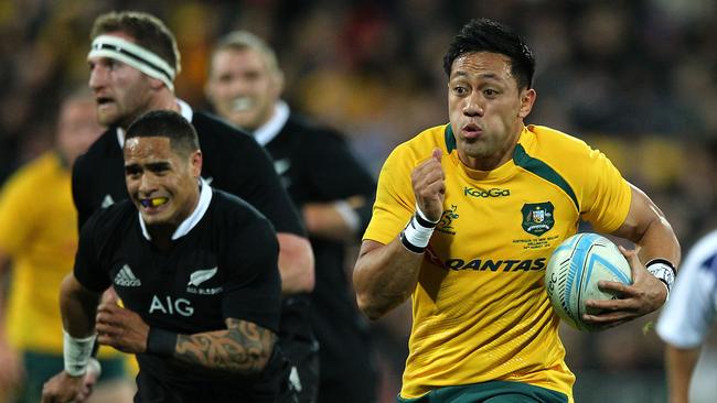 WELLINGTON, NEW ZEALAND - AUGUST 24: Christian Leali'ifano of Australia makes a break during The Rugby Championship Bledisloe Cup match between the New Zealand All Blacks and the Australian Wallabies at Westpac Stadium on August 24, 2013 in Wellington, New Zealand. (Photo by Anthony Au-Yeung/Getty Images)