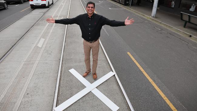 Gaurav Khanna stands in the centre of Melbourne — right outside his Indian restaurant, Tandoori Den. David Caird