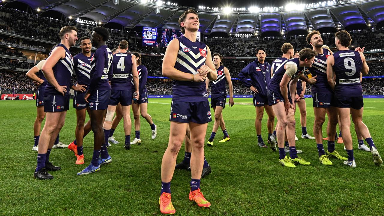 Caleb Serong and his Dockers teammates soak in the atmosphere after a finals win. Picture: Daniel Carson