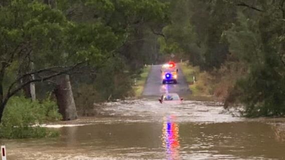 A car stuck in floodwaters at Ellesmere in the South Burnett. Picture: Jasmin Lea Hobbs